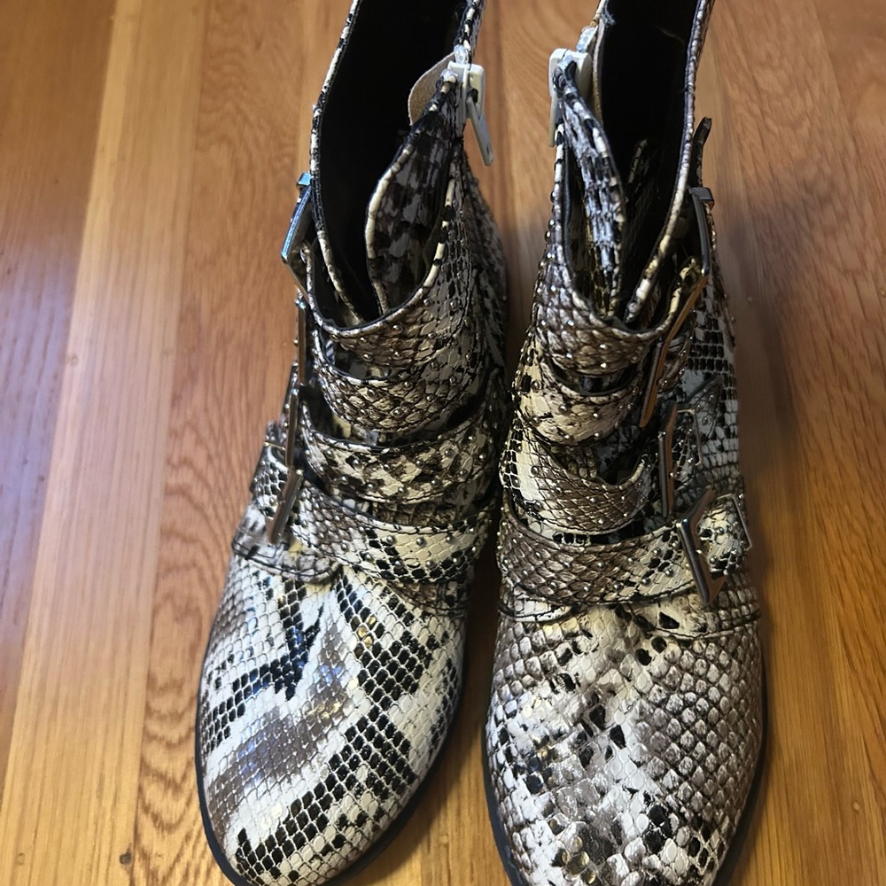 Snake print buckled ankle boots